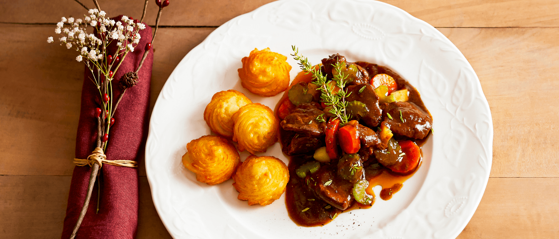 Hertenstoofvlees met kriekbier en pommes duchesse